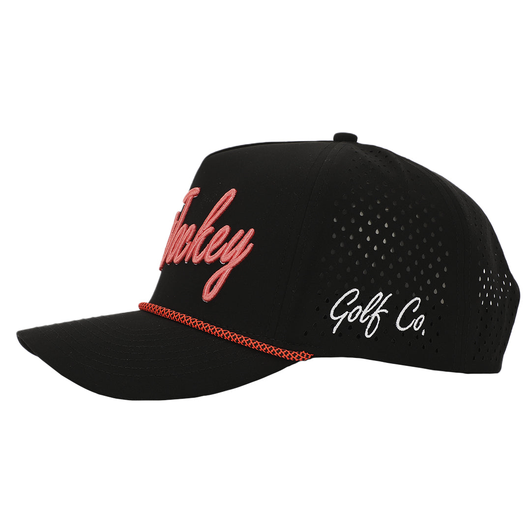 a black Cart Jockey Golf hat with red text, The Signature Midnight Bloom Rope Hat.